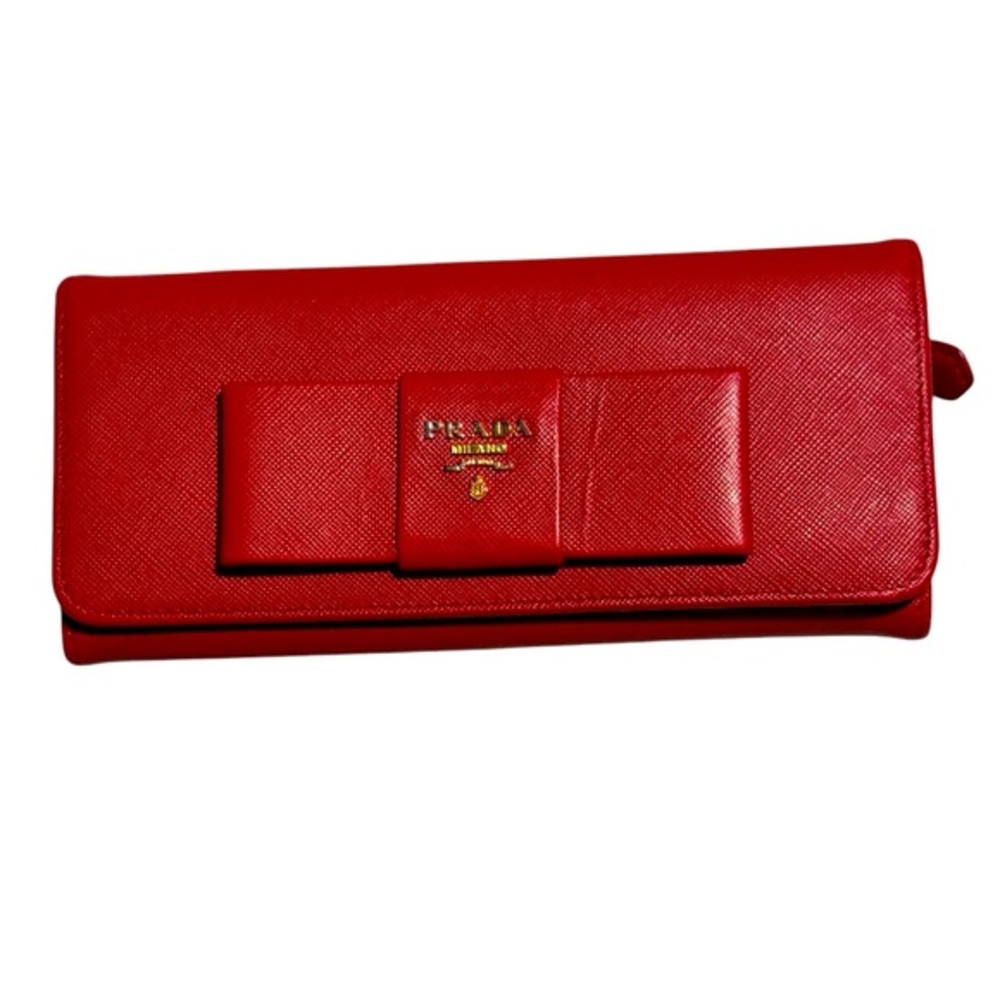 Prada Safiano Leather Ted with ribbon bow and flap closure excellent condition